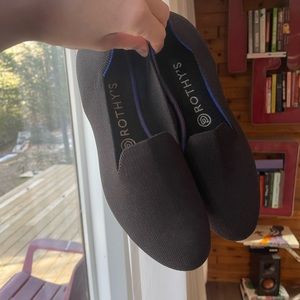 Great condition Rothy’s size 8 1/2 black with blue details